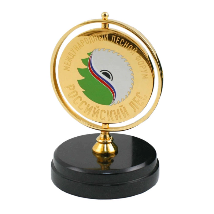 A medal spinning on a stand